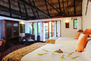 Interior of standard thatched cottage at Chaa Creek